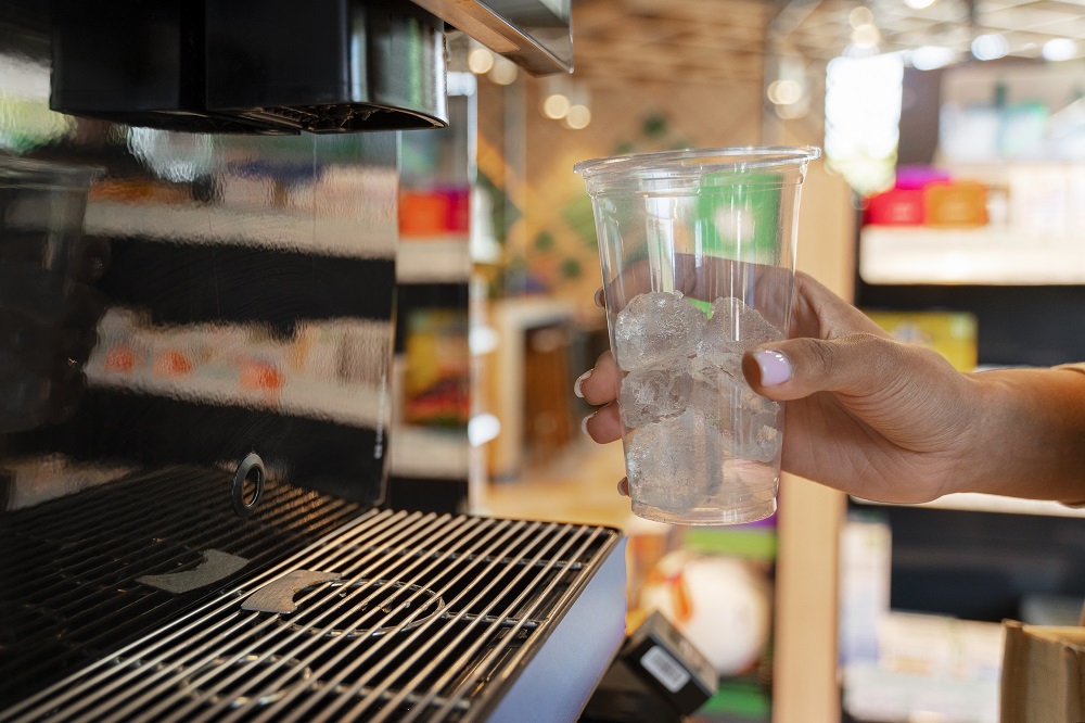 view-woman-gas-station